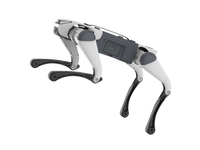 A white and grey DEEP Robotics Lite3 Basic quadruped robot, resembling a robotic dog, is positioned against a black background. The robot features four articulated legs with dark grey lower sections and textured feet, indicating its capability for agile mobility and traversing varied terrain. The main body is sleek, with a visible battery pack on its side displaying four green indicator lights, suggesting it is charged and operational.