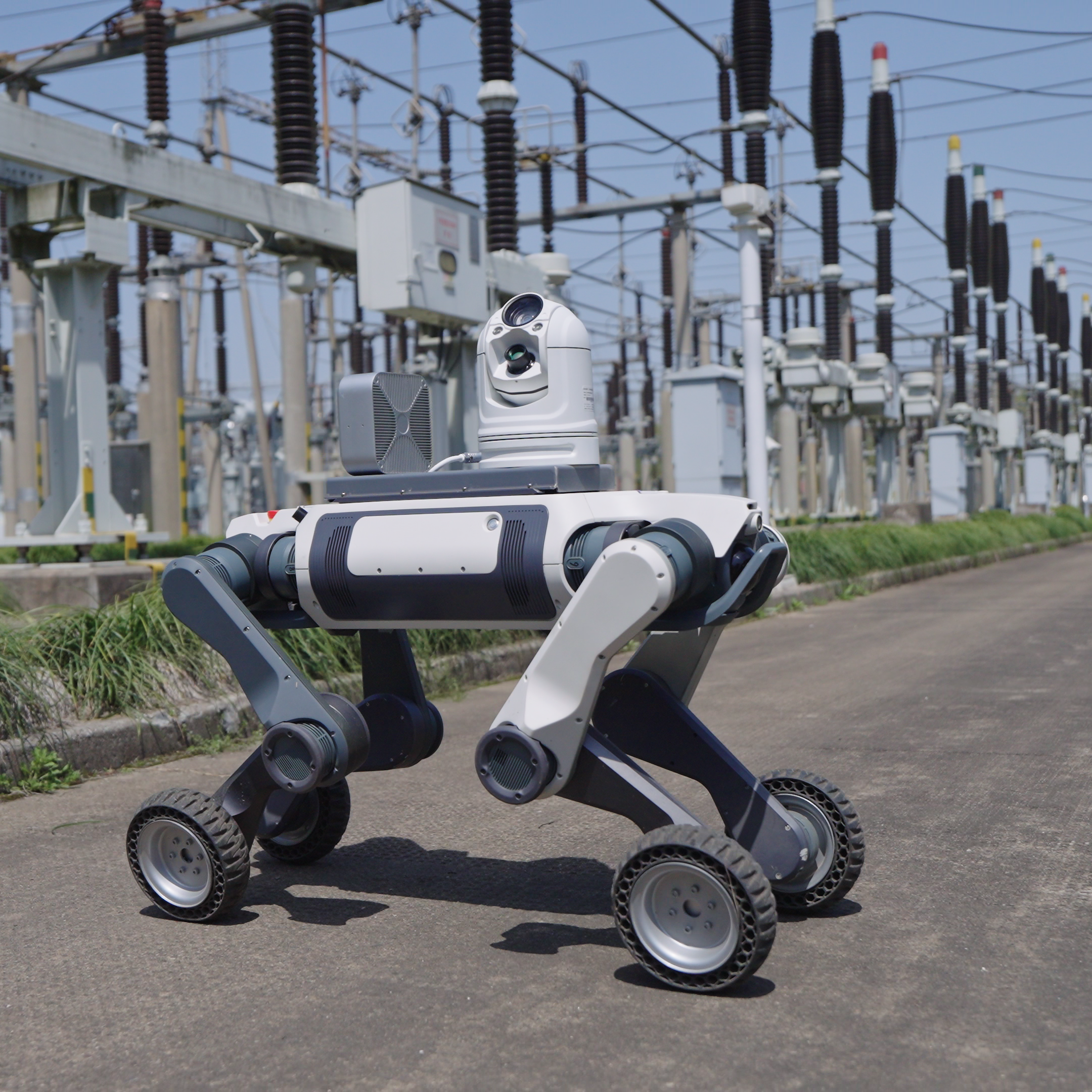 A DEEP Robotics Lynx M20 Pro wheel-legged robot, equipped with a pan-tilt camera and LiDAR, autonomously patrols an outdoor power substation. The rugged, IP66-rated quadruped robot demonstrates advanced mobility for industrial inspection and monitoring in hazardous environments.