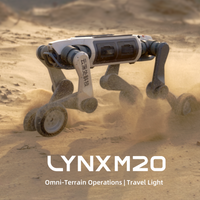 A DEEP Robotics Lynx M20 wheel-legged quadruped robot navigates a sandy desert environment, kicking up dust. The robot is designed for omni-terrain operations, industrial inspection, and emergency rescue in challenging and hazardous environments, combining the speed of wheels with the agility of legs.