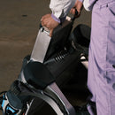 Close-up of a person's hands holding and replacing a swappable battery pack on a DEEP Robotics X30 Pro quadruped robot, highlighting its modular design for extended endurance and continuous operation in industrial and hazardous environments.